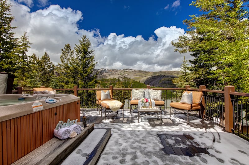 Take in panoramic alpine views from your spacious mountain-side deck.