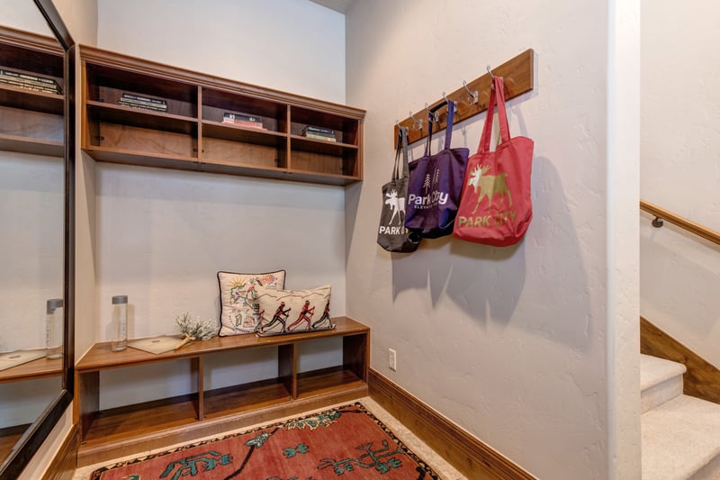 Store gear and stay organized in the built-in mudroom with hooks and bench.