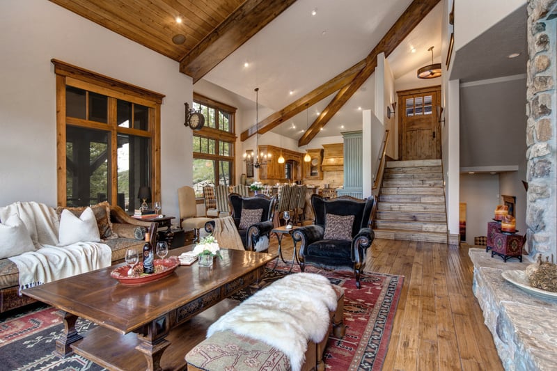 Spacious seating and layered design elements create a luxe-yet-relaxed living area for all ages.