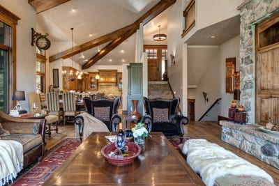 This alternate angle shows the open plan between kitchen, dining, and living for easy entertaining.