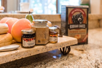 Details like stone backsplash and wood trim elevate your meal prep experience.