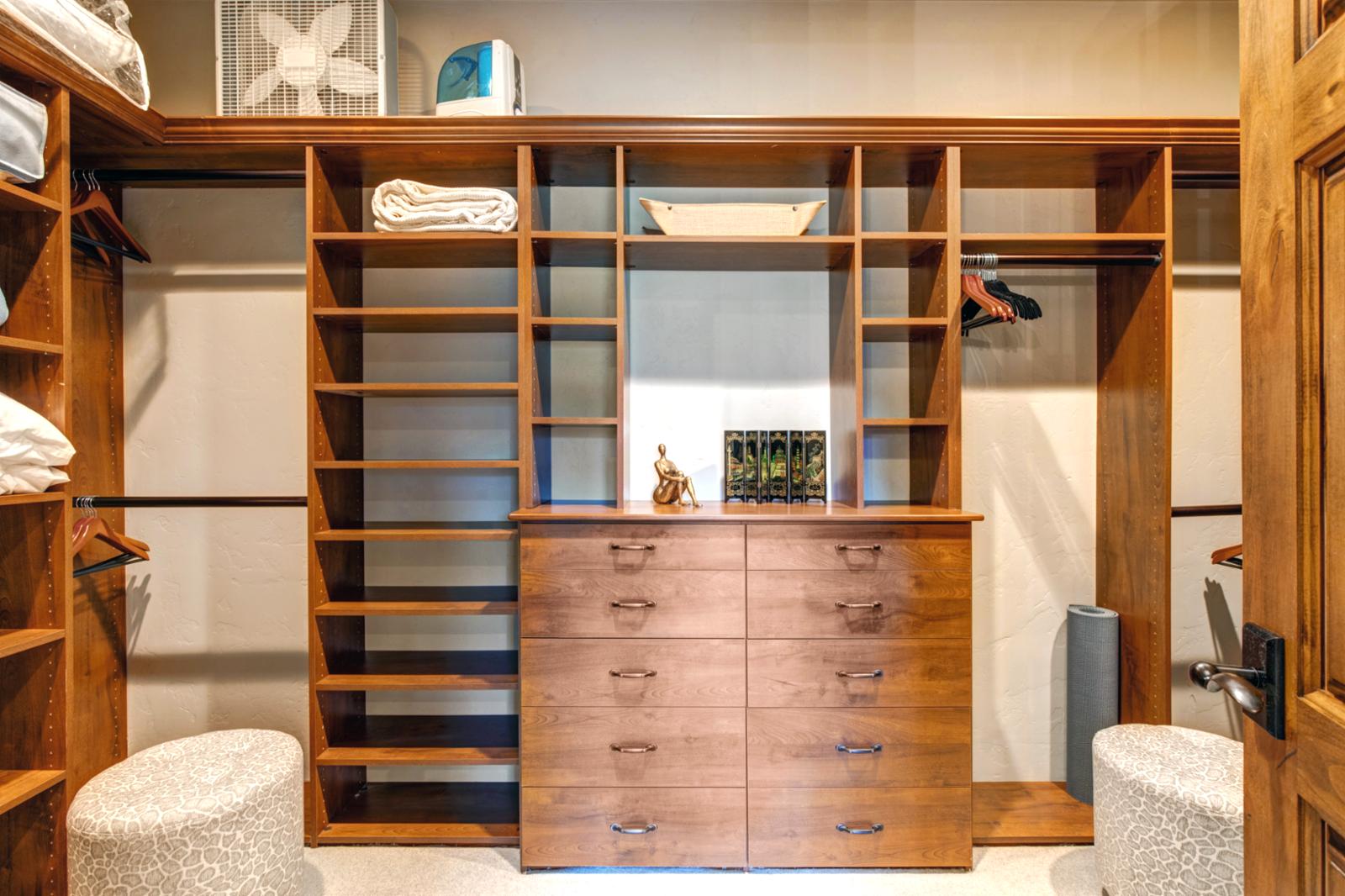 This walk-in closet offers built-ins and ample space to unpack and settle in.