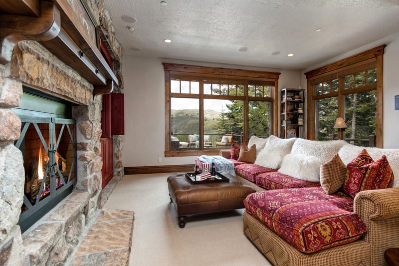 Comfortable sectional and mountain views define this family hangout spot.