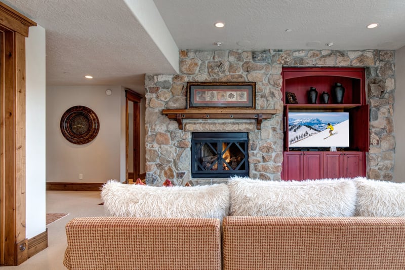 Woven textures and a pop of color give this room cozy, contemporary style.