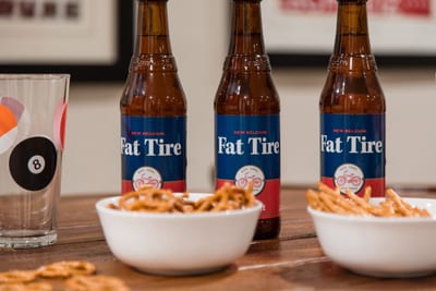 Bar snacks and brews complete the perfect night in.