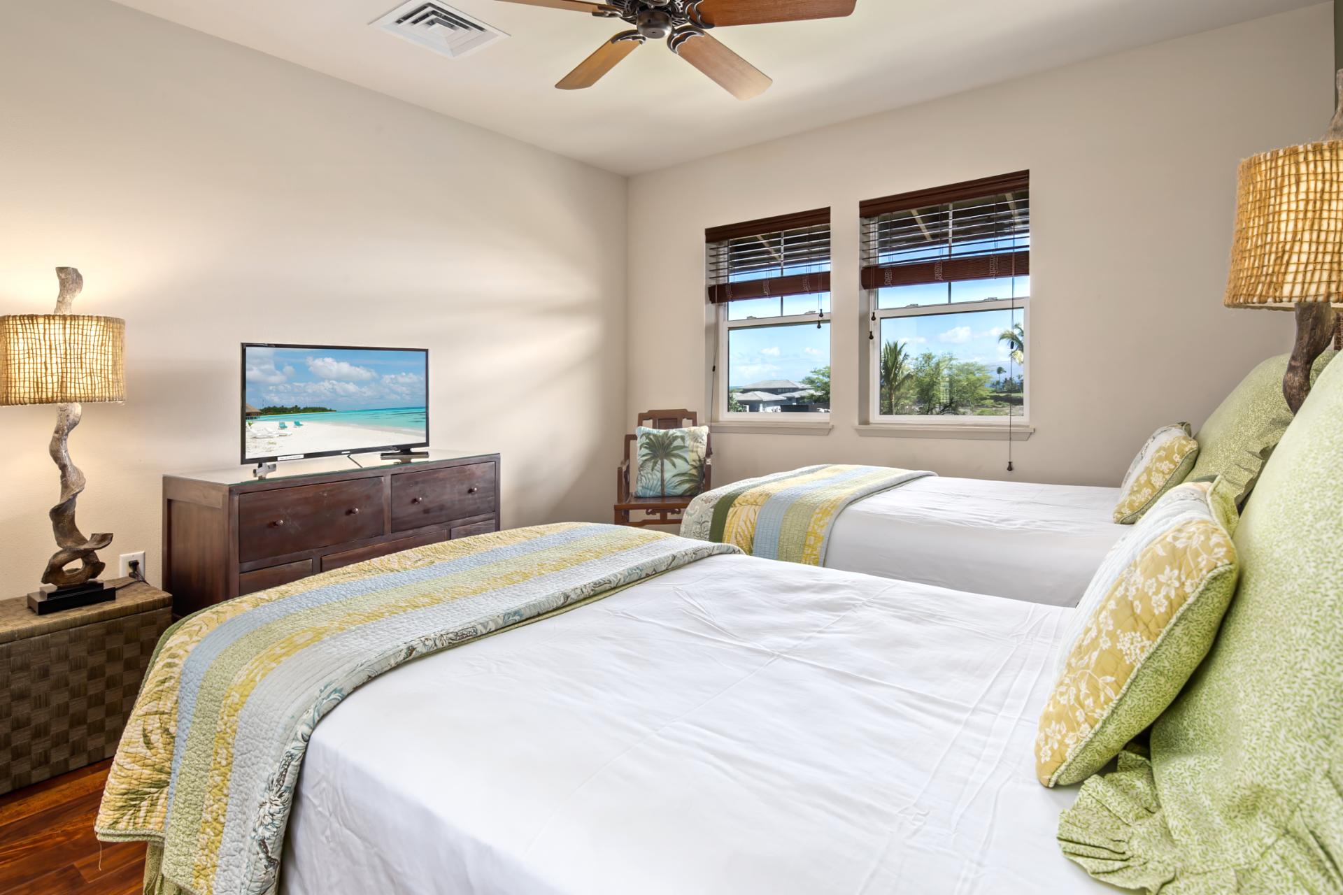 Chic tropical guest suite with warm tones, twin comfort, and a touch of island sophistication   