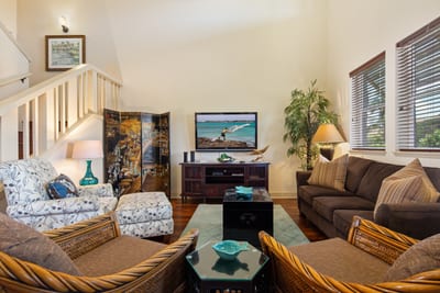A symphony of rattan, rich wood, and open light welcomes you to relax and unwind