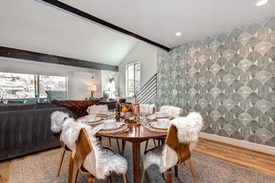 Another angle of the dining room shows space for group dinners or game nights.
