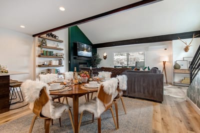 The dining area connects seamlessly to the living room, making mealtimes social and convenient.