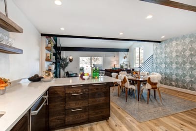 Enjoy morning coffee or cocktails at the spacious island, just steps from the dining table.