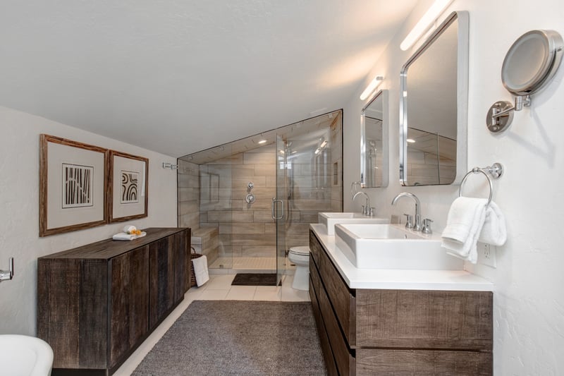 Dual vanity, granite counters, and walk-in glass shower make your primary bath feel spa-worthy.