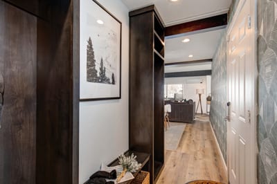 Tuck boots and jackets away in the mudroom, conveniently located off the entry hall.