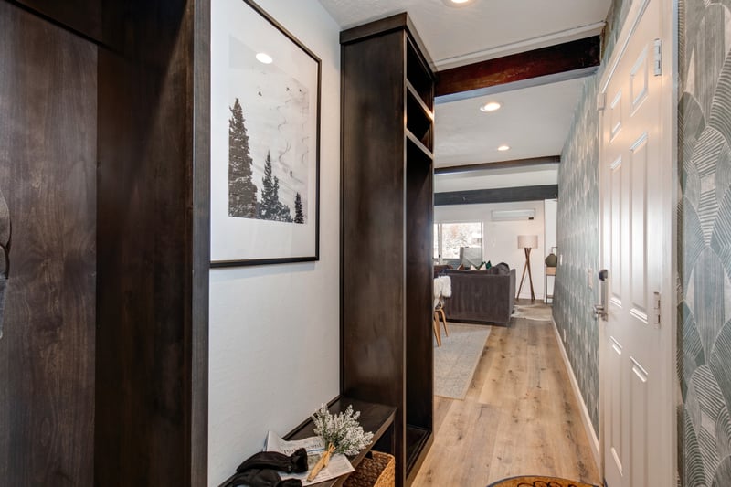 Tuck boots and jackets away in the mudroom, conveniently located off the entry hall.