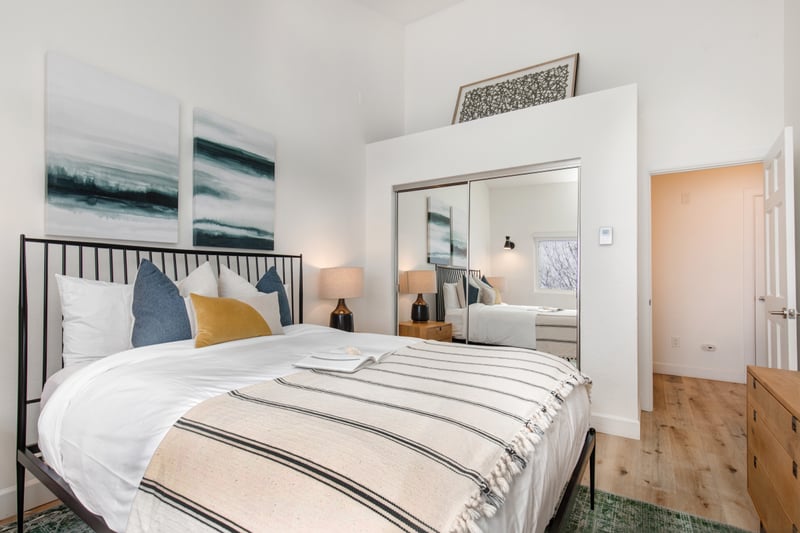 Sleep soundly in this main-level guest room with Queen bed, nightstands, and cozy linens.