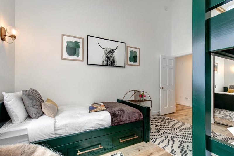 Alternate angle shows a cheerful layout with personal storage and reading lights.
