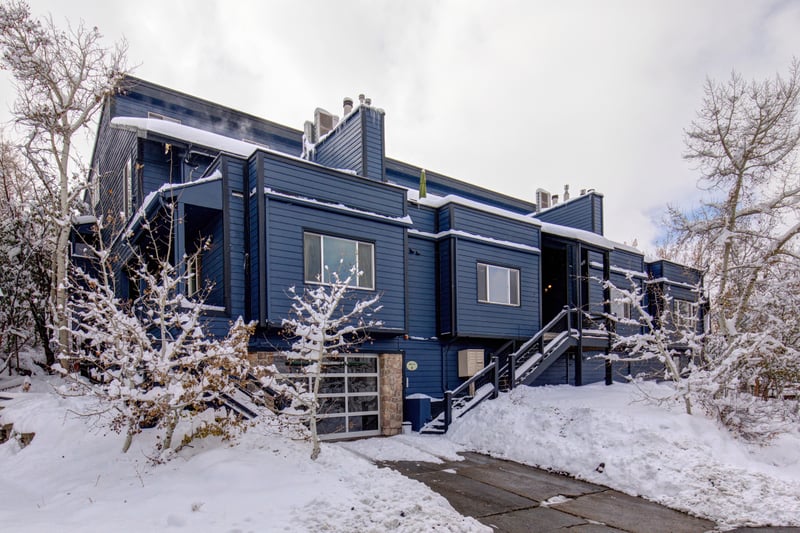 Your modern townhome retreat awaits, tucked in a snowy mountain setting with private entry.