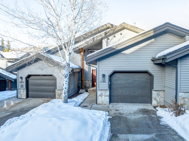 Cozy Boulder Creek townhomes with private garages in snowy Deer Valley.
