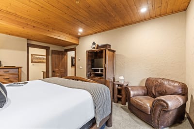 Additional seating and natural light make the master a restful retreat at any time of day.