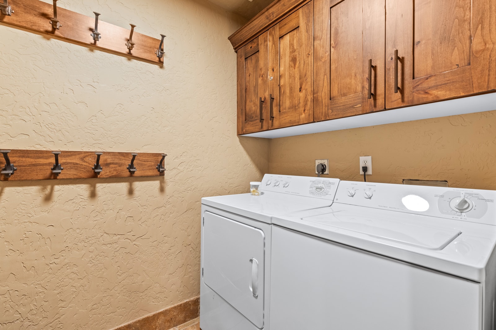In-unit laundry makes longer stays and outdoor adventures easier. Conveniently located near the entry.