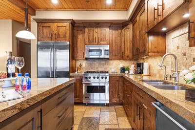 Your fully equipped kitchen features granite counters, stainless appliances, and everything you need for homemade meals.
