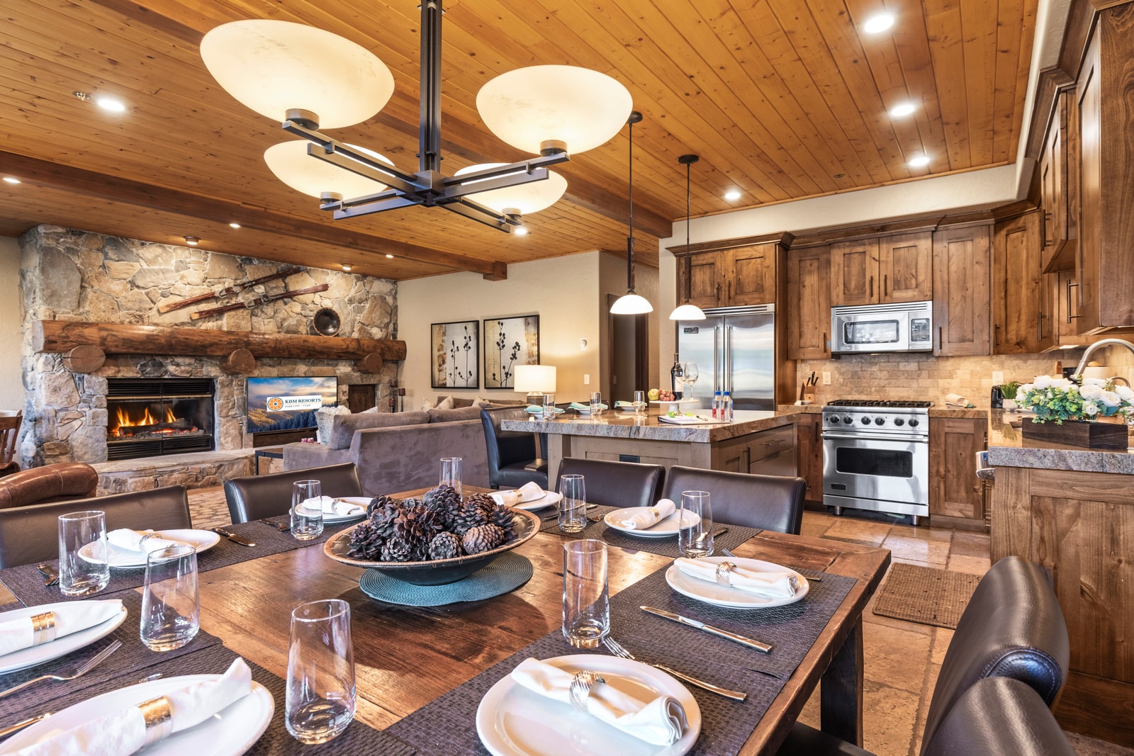 Make memories over shared meals at your round dining table with views and glowing wood finishes.