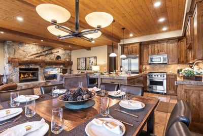 Make memories over shared meals at your round dining table with views and glowing wood finishes.