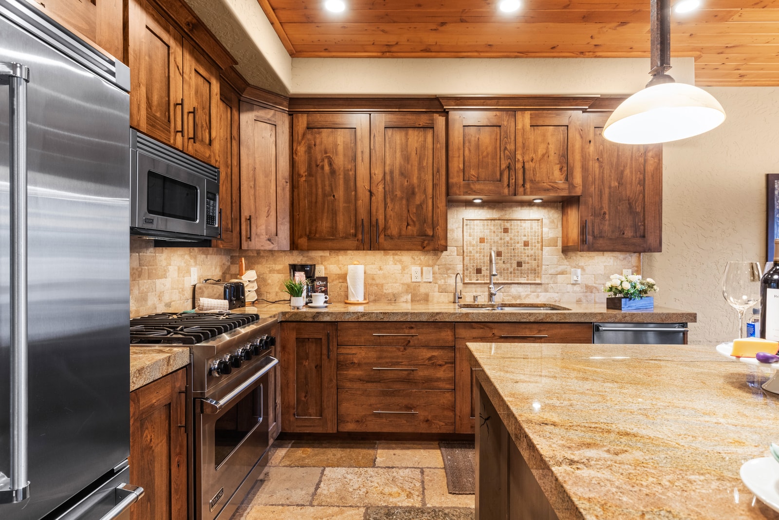 The chef in your group will love this generous kitchen with dual sinks, ample counter space, and bar seating.