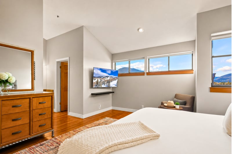 Relax and enjoy some TV in bed or watch the sun go down over the mountaintops.