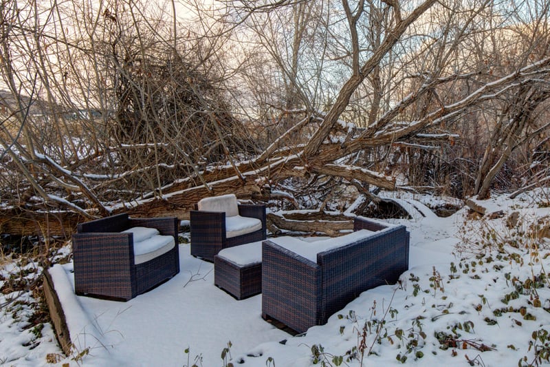 Just steps from the back door, relax in the privacy of your own outdoor serenity near the babbling brook