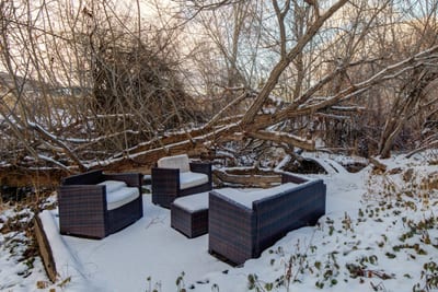 Just steps from the back door, relax in the privacy of your own outdoor serenity near the babbling brook