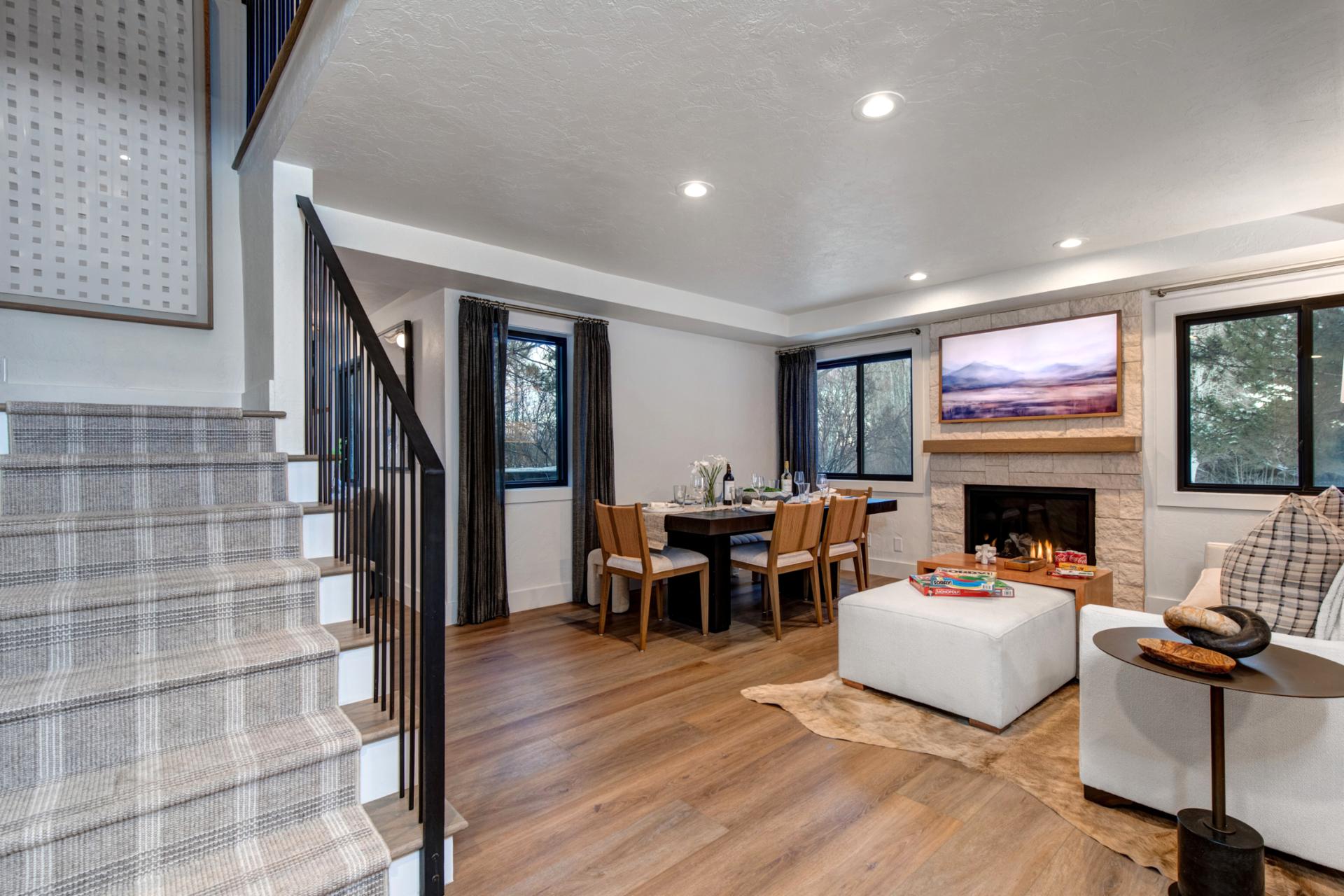 Enjoy a comfortable open space where living and dining flow seamlessly for your group