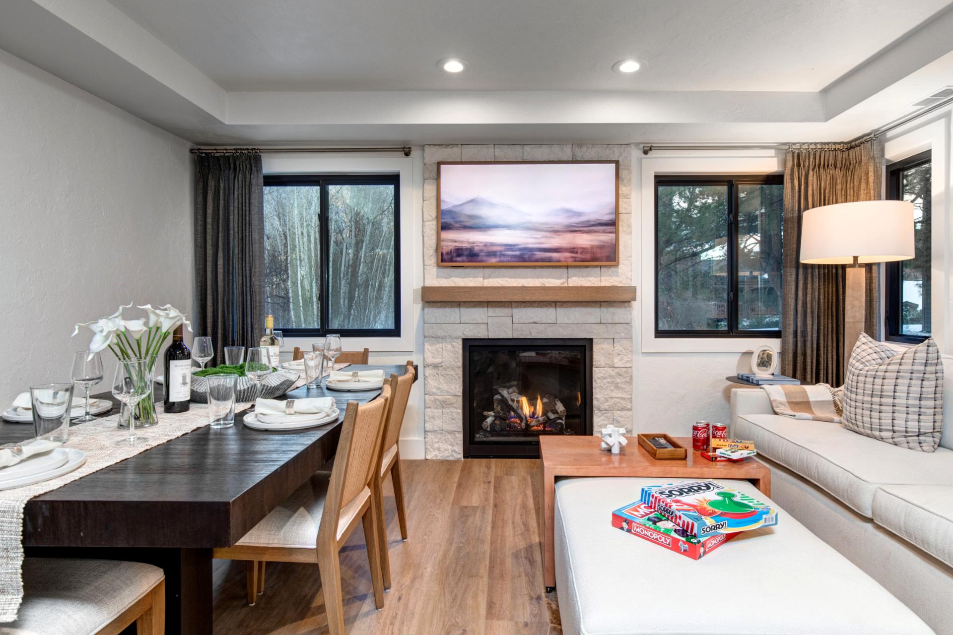 Picture Framed Smart TV transforms to your favorite shows and movies with the warmth of the gas lit fireplace