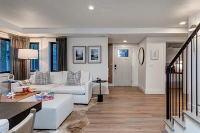 Wood floors, brightly lit, and comfortable seating