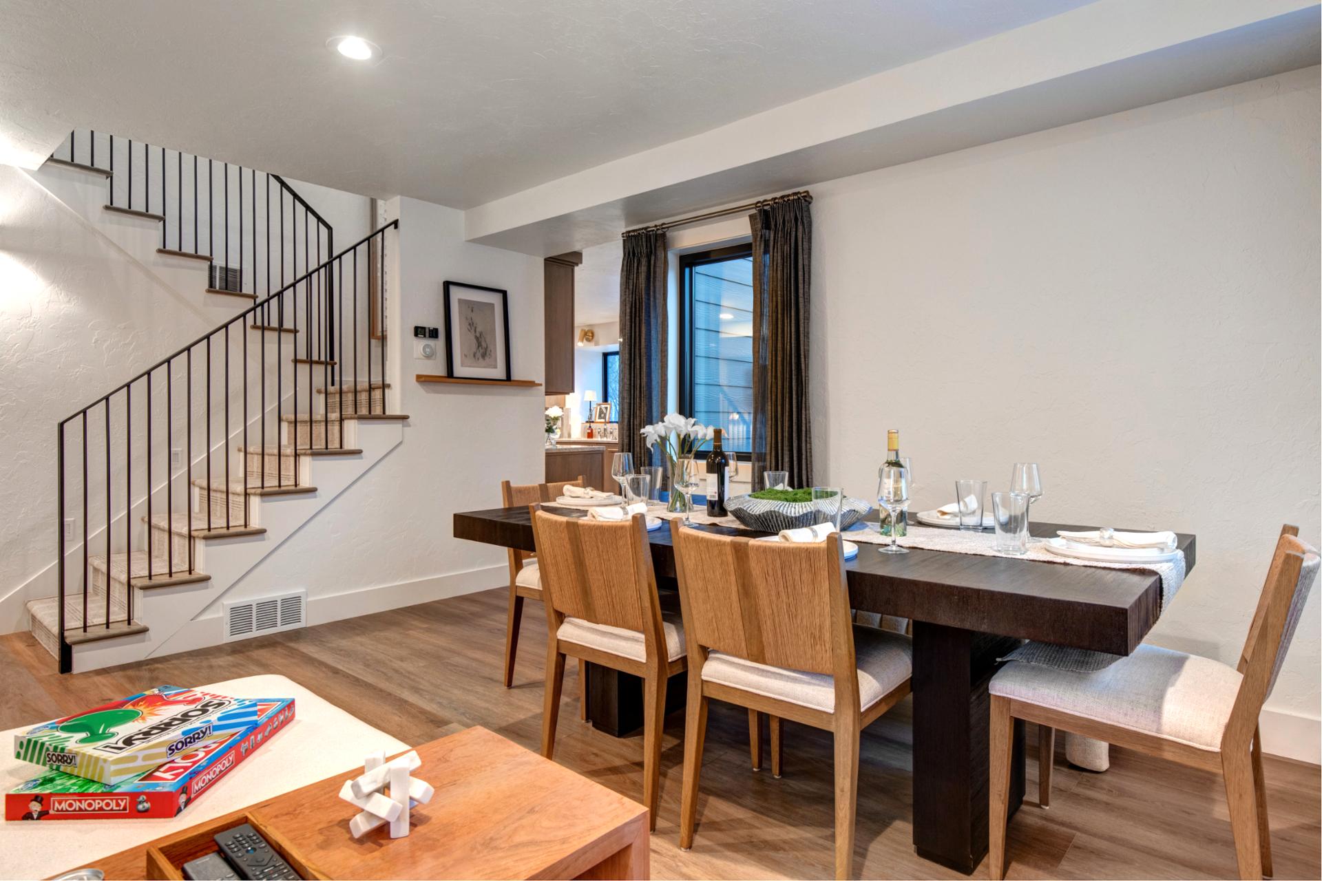 Gather together at meal time in the dining area accommodates 6, featuring both chairs and a bench.