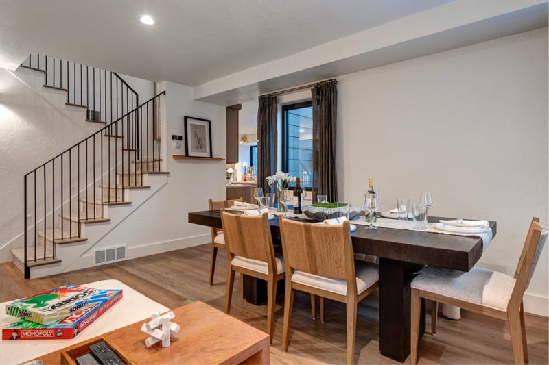 Gather together at meal time in the dining area accommodates 6, featuring both chairs and a bench.