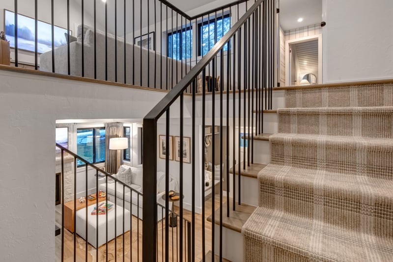 Stair access to second floor where the main bedroom, family room, bunk room, and king bedroom are located