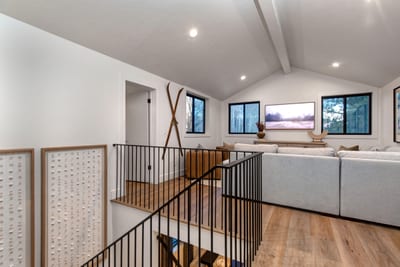 A bright, well-lit family room is warm and welcoming.