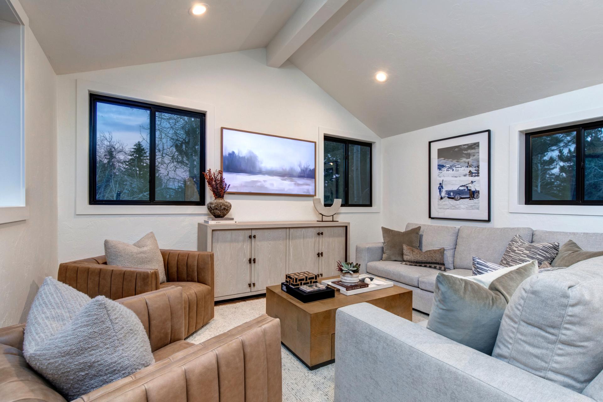 Second-level family room perfect for entertainment—whether gaming, movies, or your favorite series