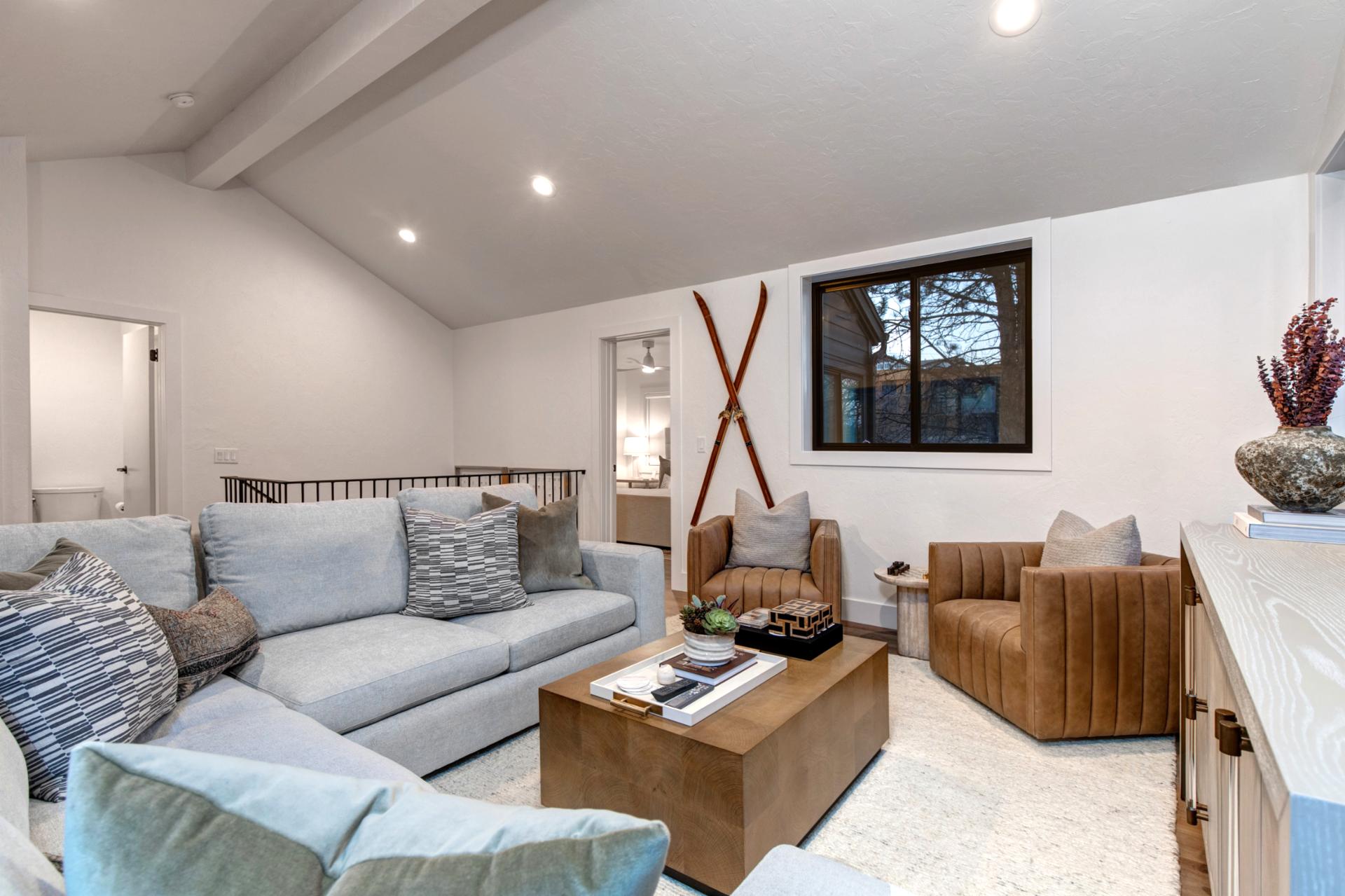 A mountain-elegant family room designed for creating unforgettable vacation memories.