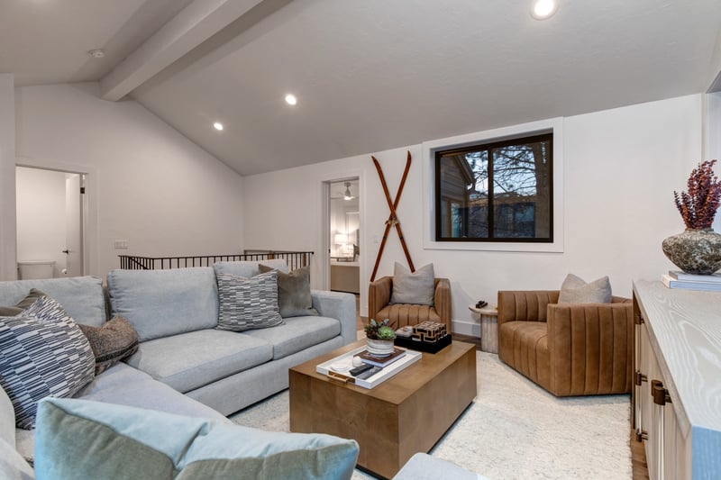 A mountain-elegant family room designed for creating unforgettable vacation memories.