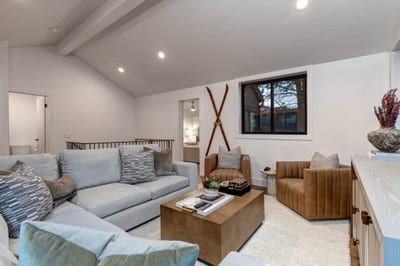 A mountain-elegant family room designed for creating unforgettable vacation memories.
