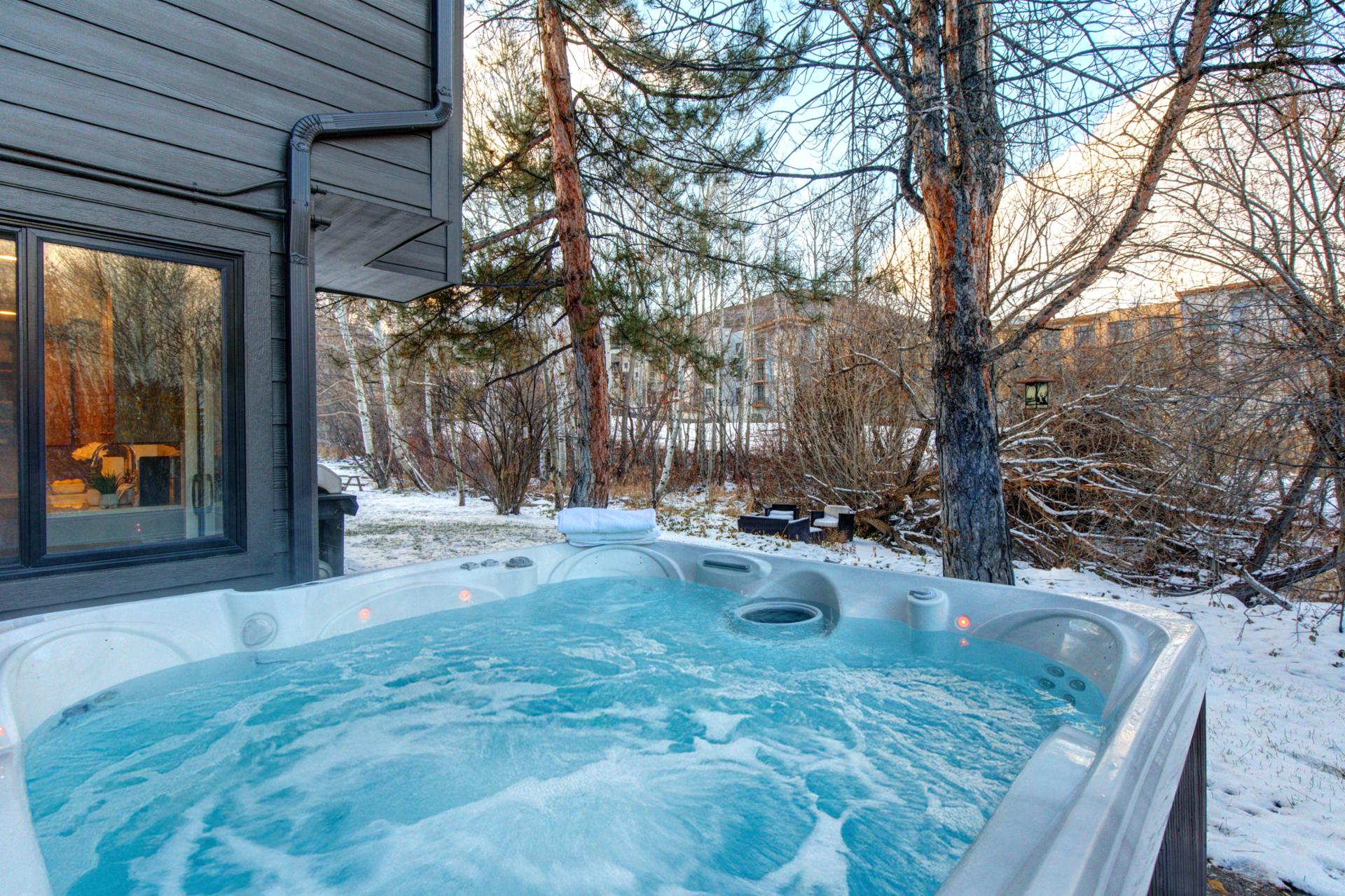 After a day on the mountain, unwind in your private outdoor hot tub.