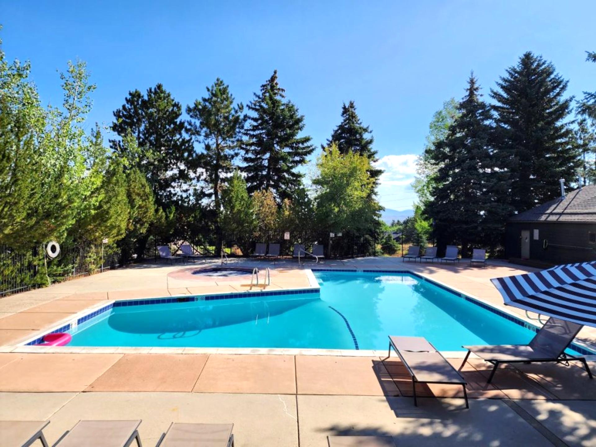 Take a dip in the outdoor pool surrounded by mountain views.
