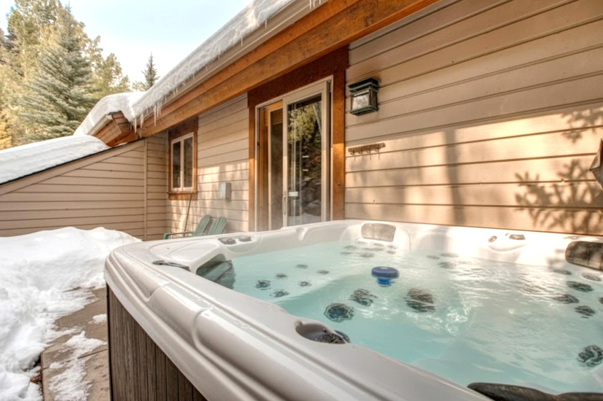 Soak in your private hot tub under the pines after a day on the slopes or trails. Steps from your back door and fully enclosed for privacy.