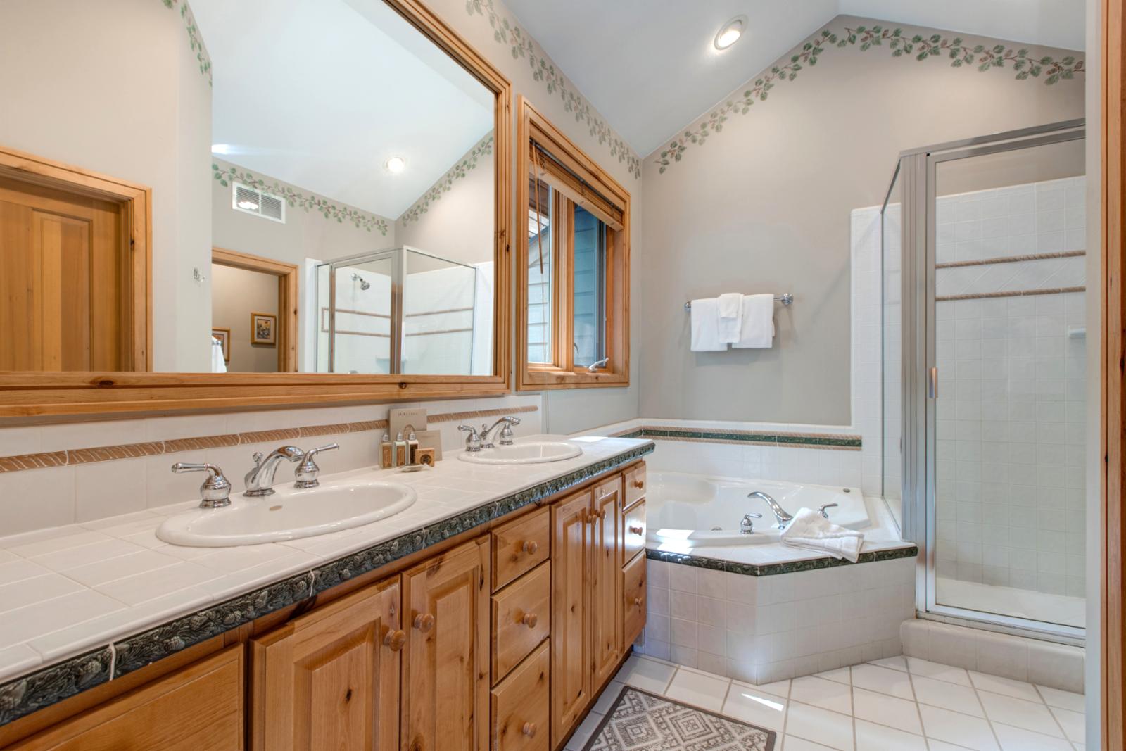 Refresh in your private ensuite with a step-in shower, jetted soaking tub, and dual vanity stocked with L’Occitane amenities.