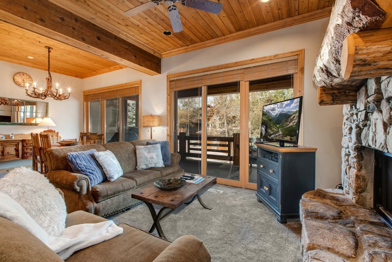 Connect easily between the living, dining, and kitchen areas in this open-concept main floor, designed for seamless group stays.
