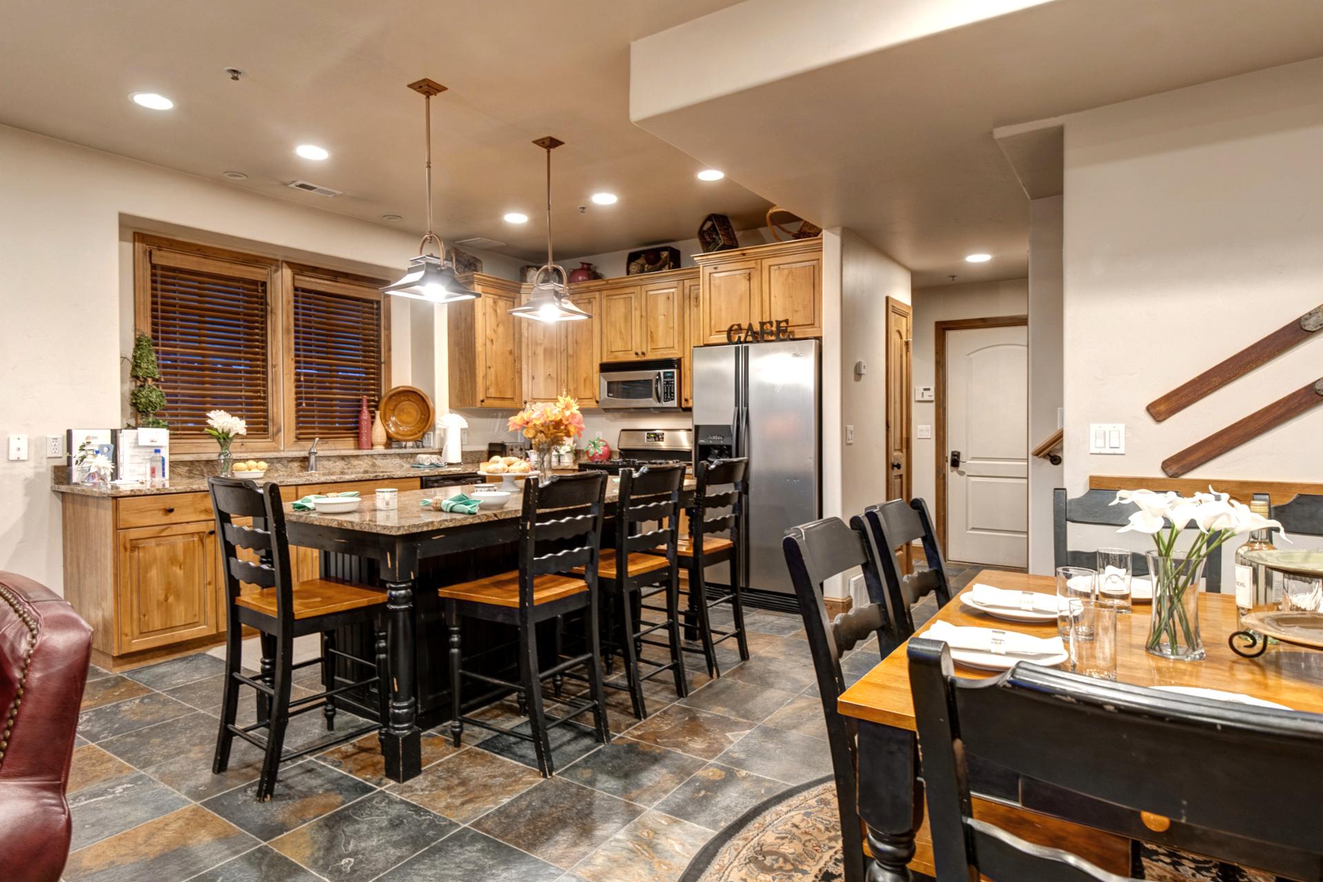 8 seat dining table plus 4 additional kitchen bar seating