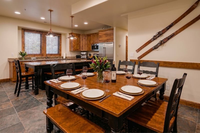 Share meals at your large dining table for eight with ski decor and mountain lodge vibes. PPS-1416