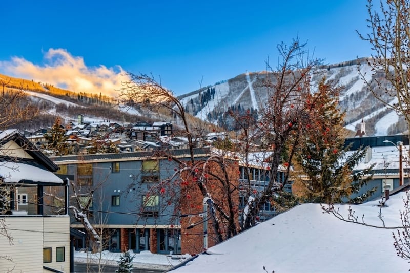 Framed view of the Park City ski slopes and village rooftops right from the property. PPS-1416