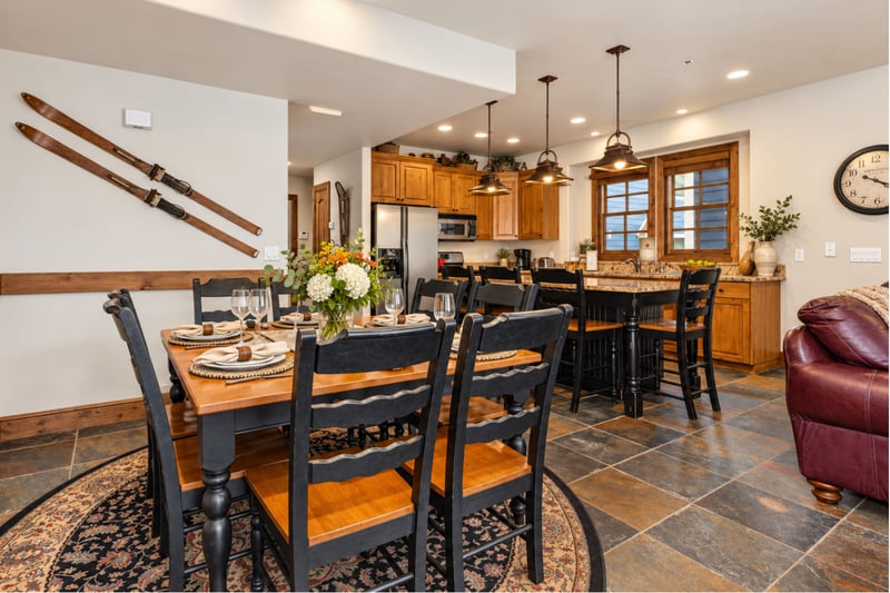 Share meals and stories at your dining table for eight, perfectly set between the kitchen and living room.